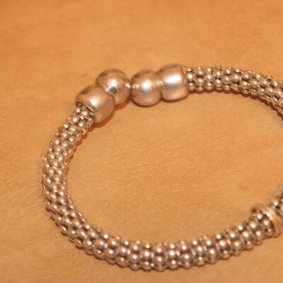Sterling silver flexi-cable design .