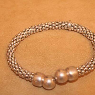 Sterling silver flexi-cable design .