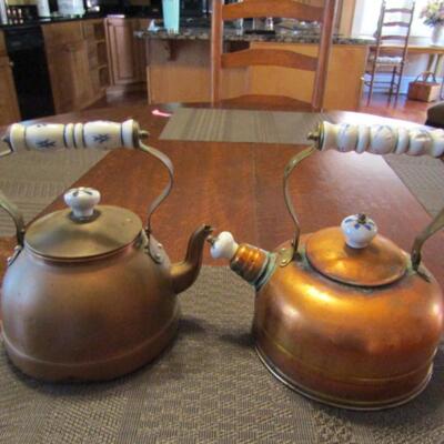 Two Copper Finished Tea Kettles