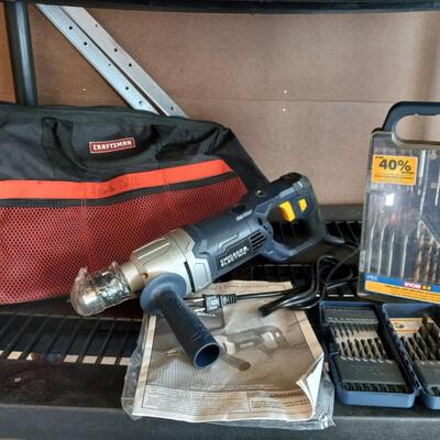 LOT 93  HEAVY DUTY D-HANDLE DRILL, TOOL BAG AND DRILL BITS
