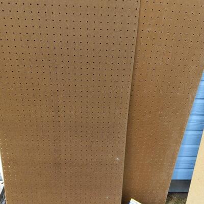LOT 105  TWO PIECES OF PEG BOARD AND PEG BOARD HOOKS