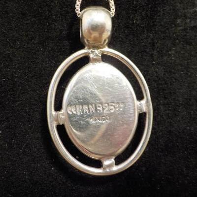 Sterling silver turquoise raised stone.