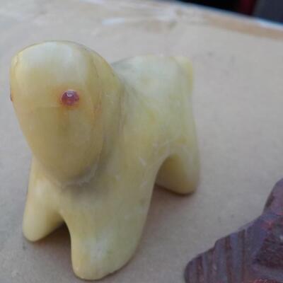 Hand crafted polar bear (jade) and snake (red stone).