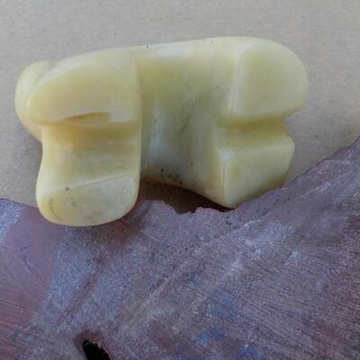 Hand crafted polar bear (jade) and snake (red stone).