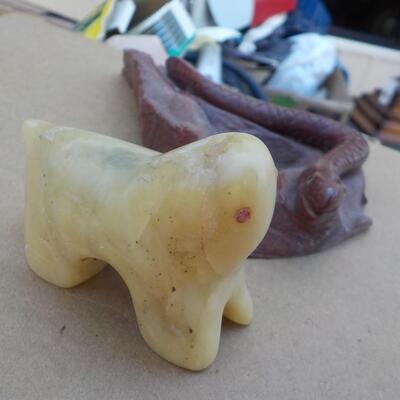 Hand crafted polar bear (jade) and snake (red stone).