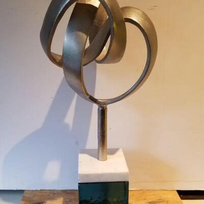 Art- mid-century metal knot sculpture on solid glass and Stone base