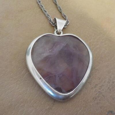 Stunning Sterling silver Amethyst heart shape necklace.