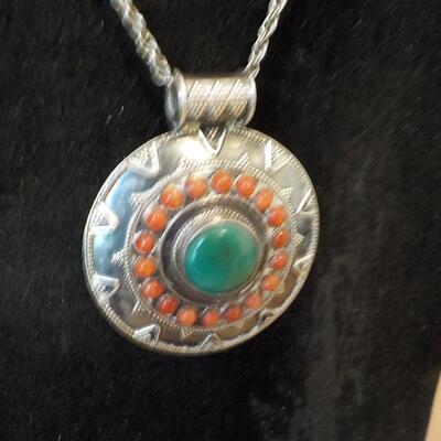 Art-Deco Sterling silver with jade and tigers eye stones.