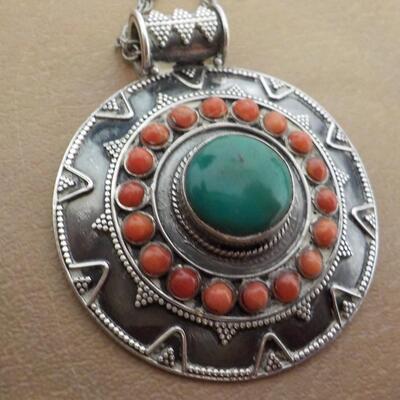 Art-Deco Sterling silver with jade and tigers eye stones.