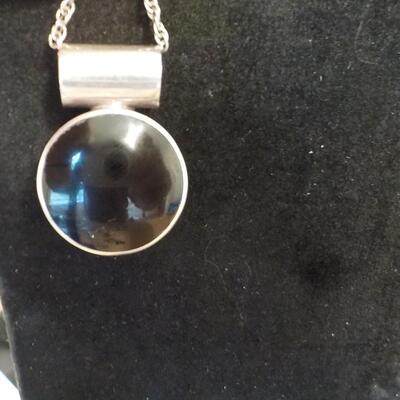 Sterling silver moon style necklace w/ reverse color.