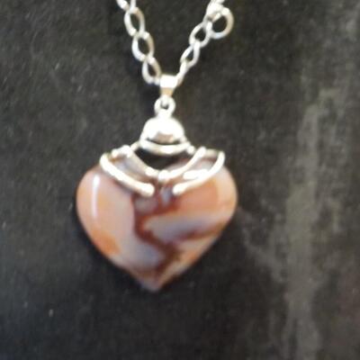 Sterling silver multi color amethyst stone heart.