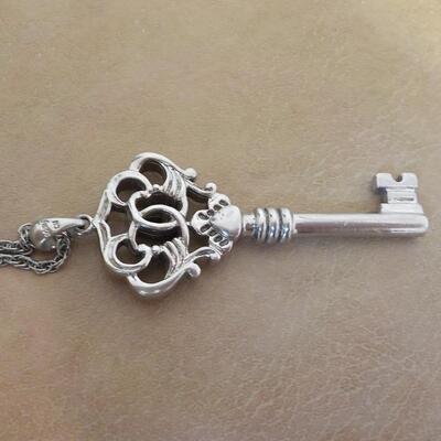 Sterling silver skeleton key necklace.