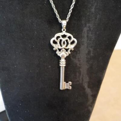 Sterling silver skeleton key necklace.