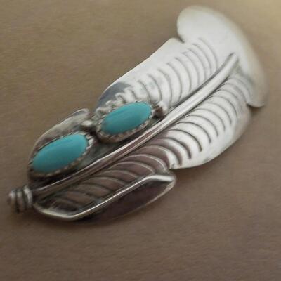 Sterling silver Navaho feather and torques necklace.