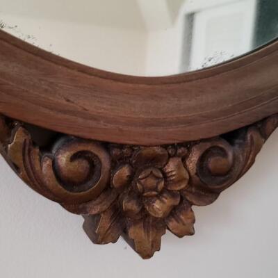 Antique shield-shaped mirror, wood frame