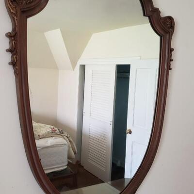 Antique shield-shaped mirror, wood frame