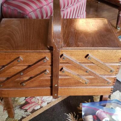 Cantilever Sewing box with three levels and with thread and buttons