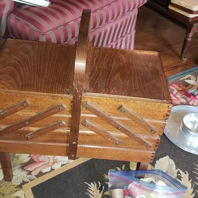 Cantilever Sewing box with three levels and with thread and buttons