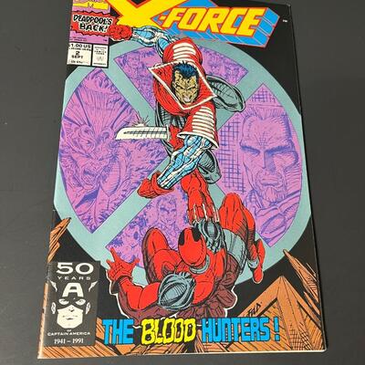 LOT 28: Four X-Force Marvel Comic Books
