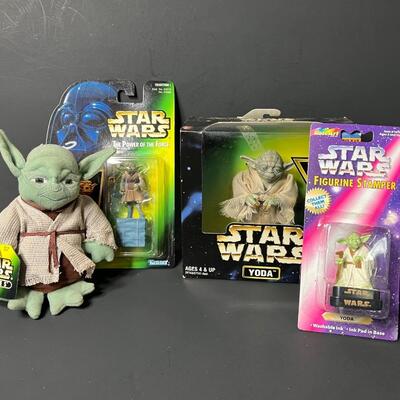 LOT 49: YODA! A Lot of Star Wars Collectibles Featuring The Green Jedi Master, It Is