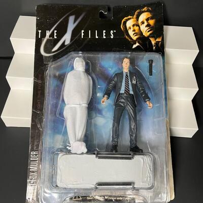 LOT 65:  X-Files McFarlane Action Figures (4)