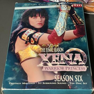 LOT 75: Big Lot of Xena Memorabilia - DVDs, VHS, Jewelry, Posters & More