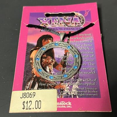 LOT 75: Big Lot of Xena Memorabilia - DVDs, VHS, Jewelry, Posters & More