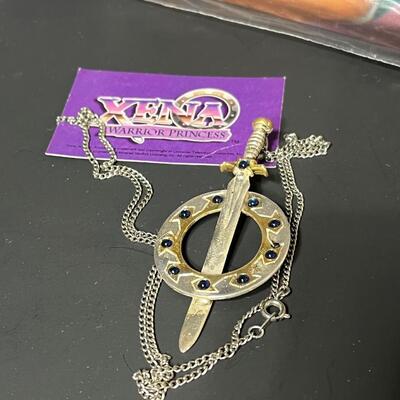 LOT 75: Big Lot of Xena Memorabilia - DVDs, VHS, Jewelry, Posters & More