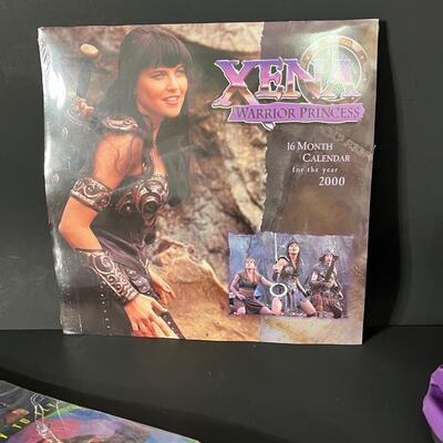 LOT 75: Big Lot of Xena Memorabilia - DVDs, VHS, Jewelry, Posters & More