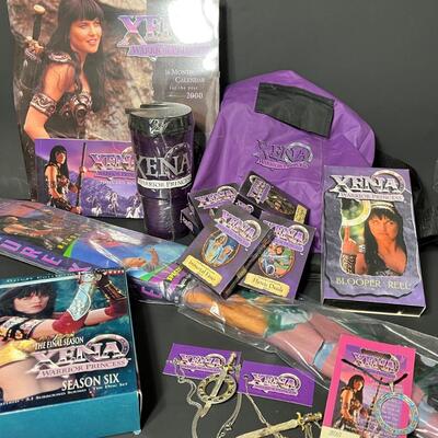 LOT 75: Big Lot of Xena Memorabilia - DVDs, VHS, Jewelry, Posters & More
