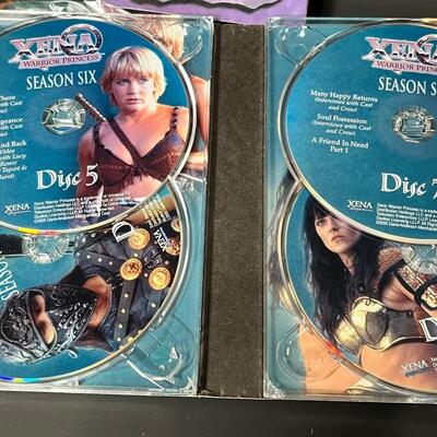 LOT 75: Big Lot of Xena Memorabilia - DVDs, VHS, Jewelry, Posters & More