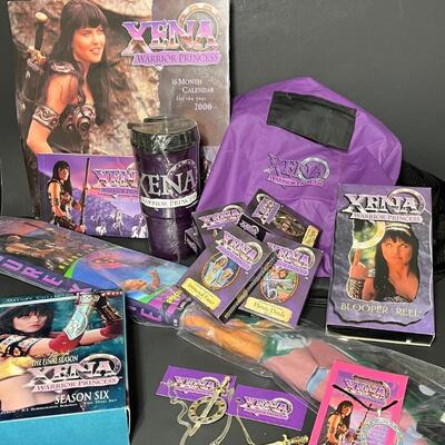LOT 75: Big Lot of Xena Memorabilia - DVDs, VHS, Jewelry, Posters & More