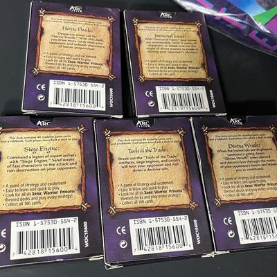 LOT 75: Big Lot of Xena Memorabilia - DVDs, VHS, Jewelry, Posters & More