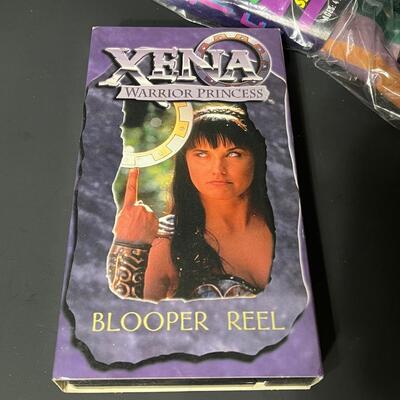 LOT 75: Big Lot of Xena Memorabilia - DVDs, VHS, Jewelry, Posters & More
