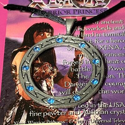 LOT 75: Big Lot of Xena Memorabilia - DVDs, VHS, Jewelry, Posters & More