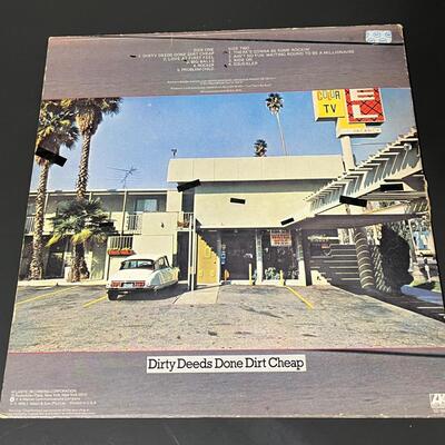 LOT 81: Four AC/DC Vinyl Records - Back In Black & More