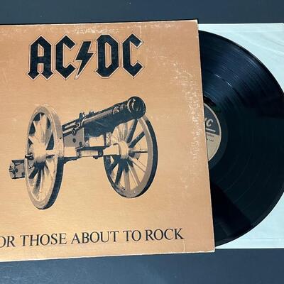 LOT 81: Four AC/DC Vinyl Records - Back In Black & More