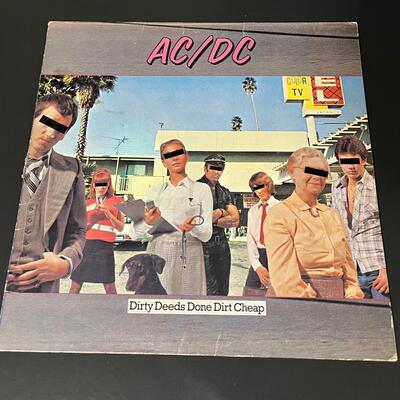 LOT 81: Four AC/DC Vinyl Records - Back In Black & More