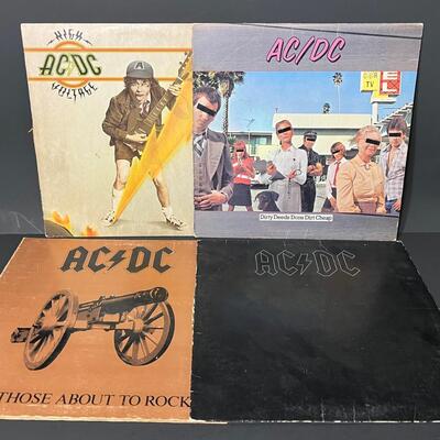 LOT 81: Four AC/DC Vinyl Records - Back In Black & More