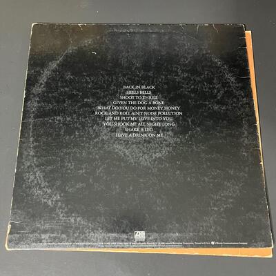 LOT 81: Four AC/DC Vinyl Records - Back In Black & More
