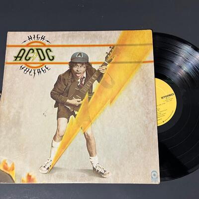 LOT 81: Four AC/DC Vinyl Records - Back In Black & More