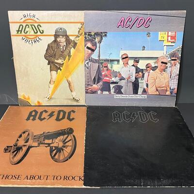 LOT 81: Four AC/DC Vinyl Records - Back In Black & More