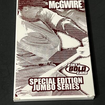 LOT 99: Mark McGwire 70 Home Runs Figure + Baseball Cards