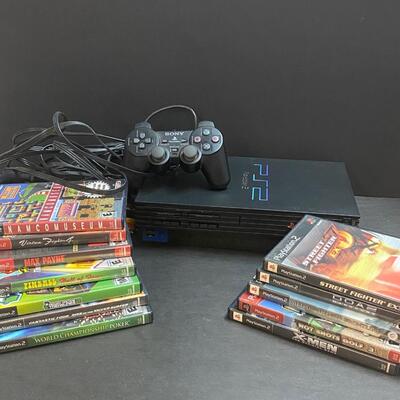 LOT 105: PlayStation 2 and games.