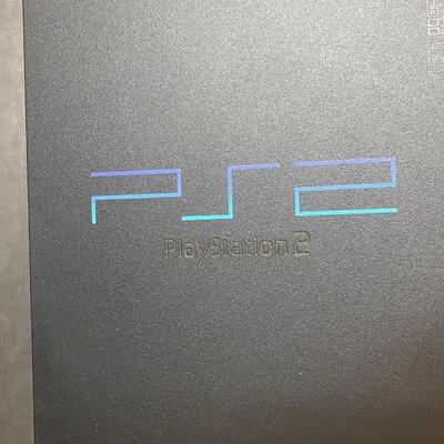 LOT 105: PlayStation 2 and games.