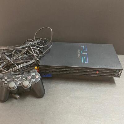 LOT 105: PlayStation 2 and games.