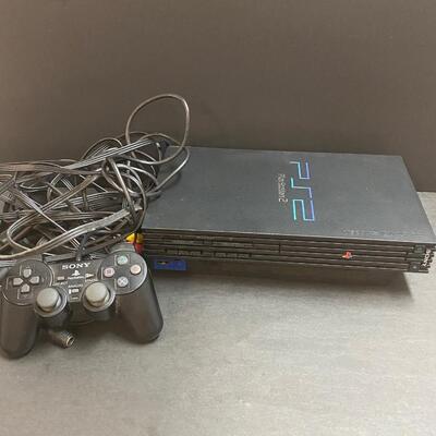 LOT 105: PlayStation 2 and games.