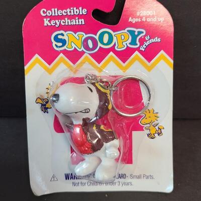LOT 121: Vintage Toy Lot: Taco Bell Dog, Snoopy and More