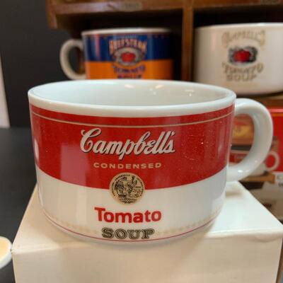 LOT:140: Lot of Campbellâ€™s Soup 4 Mugs with shelf and figure.