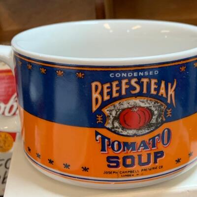 LOT:140: Lot of Campbellâ€™s Soup 4 Mugs with shelf and figure.